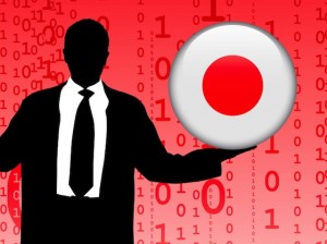 Businessman-Holding-China-and-Japan-Internet-Flag-Buttons